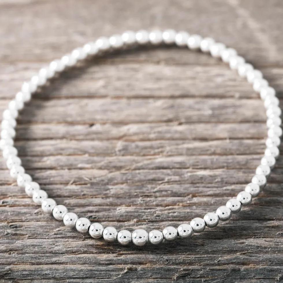 silverarmband_elastiskt_m_1.webp Best Faith Silverarmband elastiskt med 3mm kulor