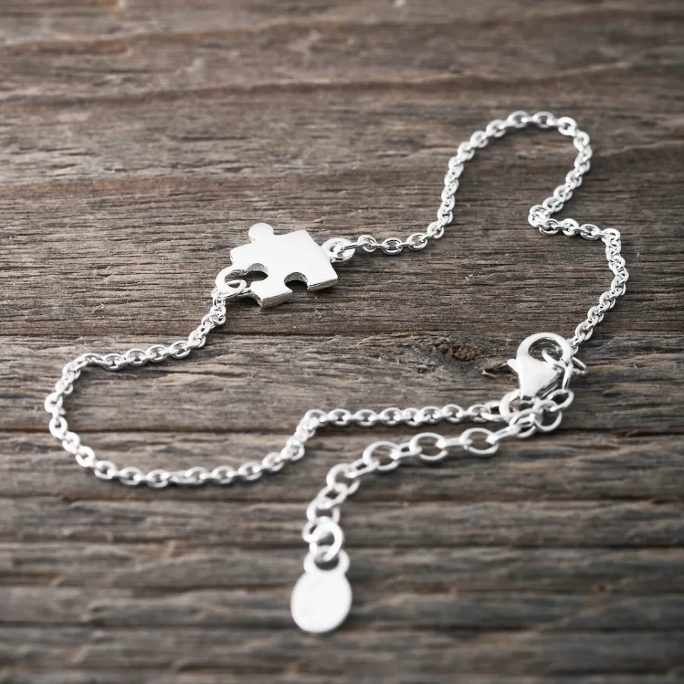 silverarmband_liten_pusse_0.webp Outlet Faith Silverarmband liten pusselbit