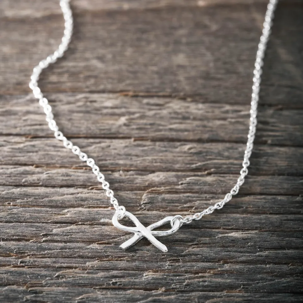 silverhalsband_liten_rose_0.webp Best Faith Silverhalsband liten rosett